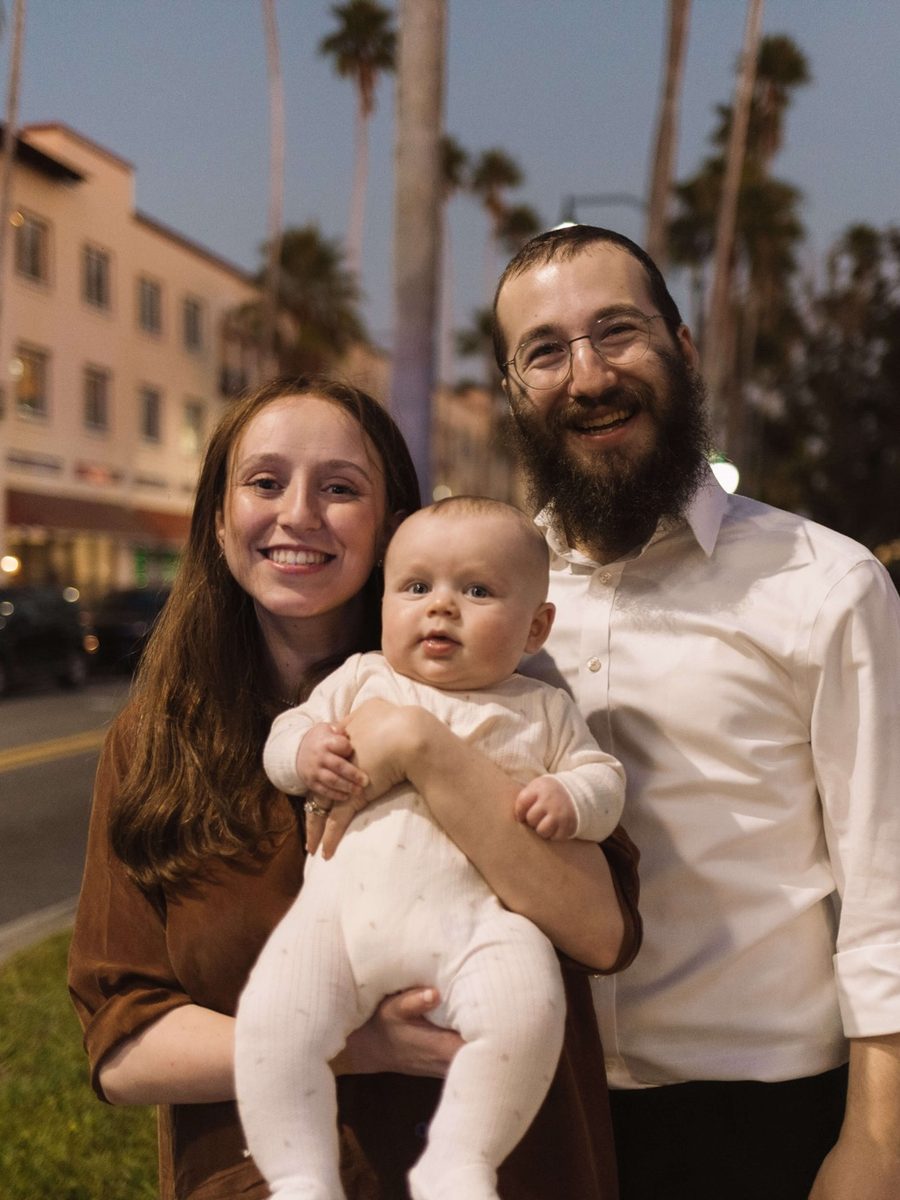 Rabbi Srolik and Nechama Sputz with their son Levi Yitzchok