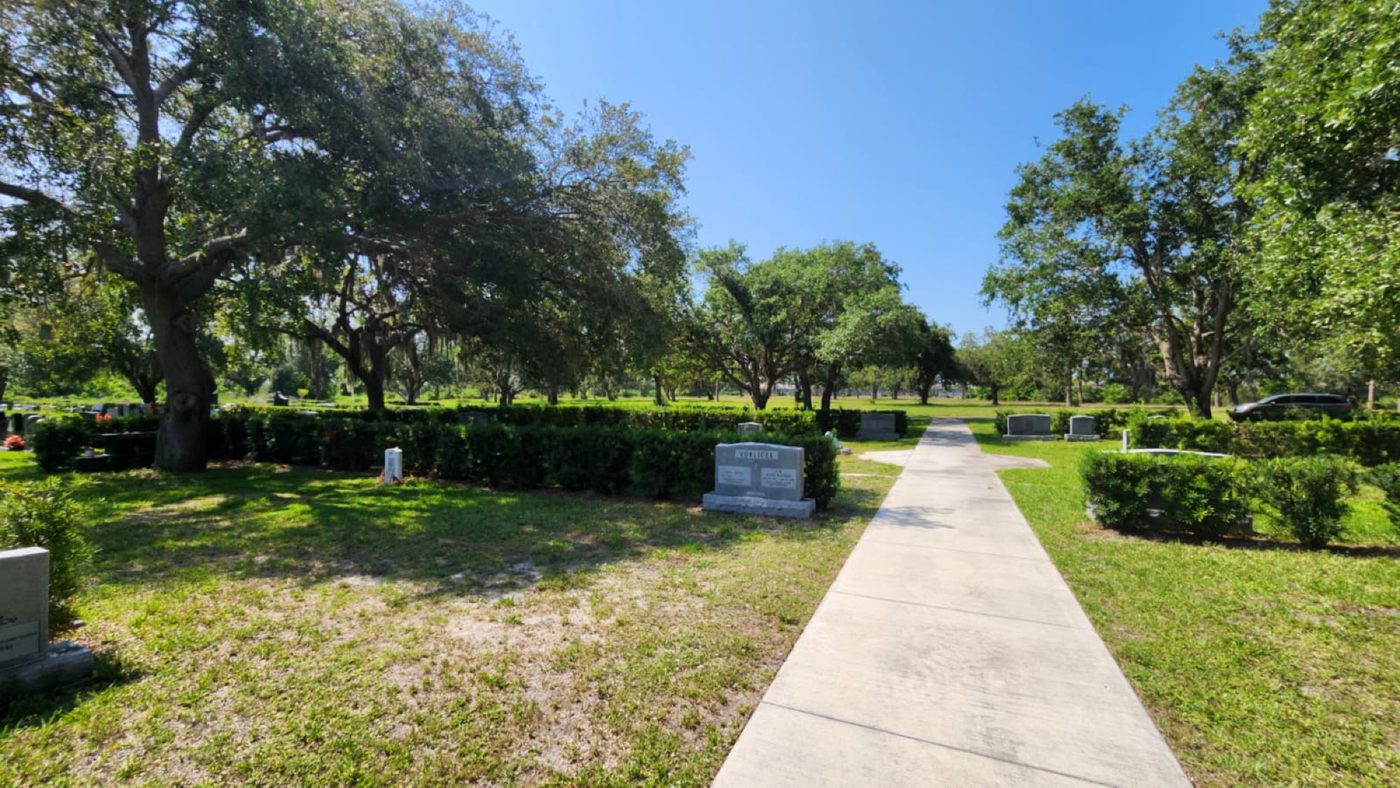 A paved path between the hedges of Jerusalem Gardens