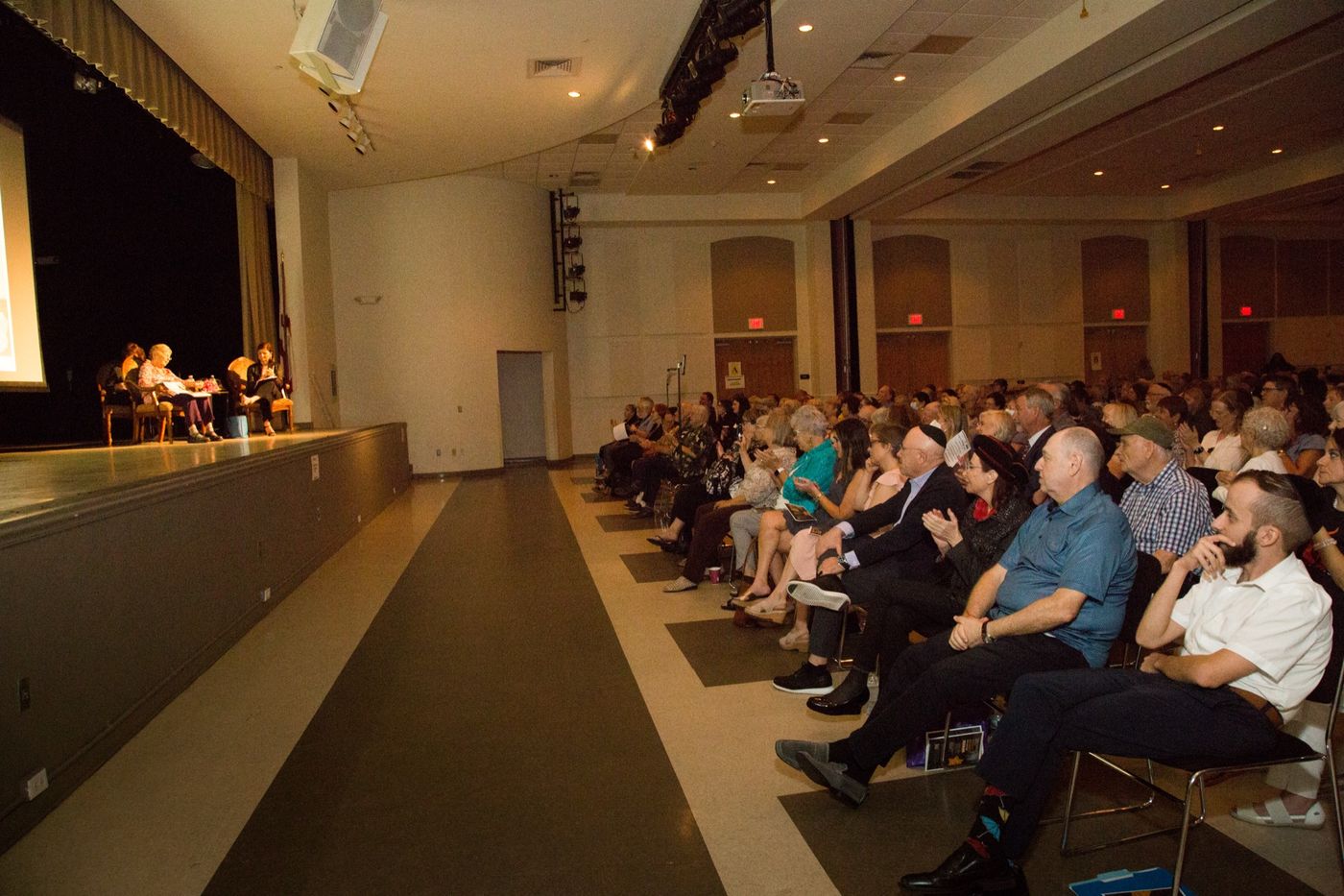 The community gathered to hear Holocaust survivor Helga Melmed